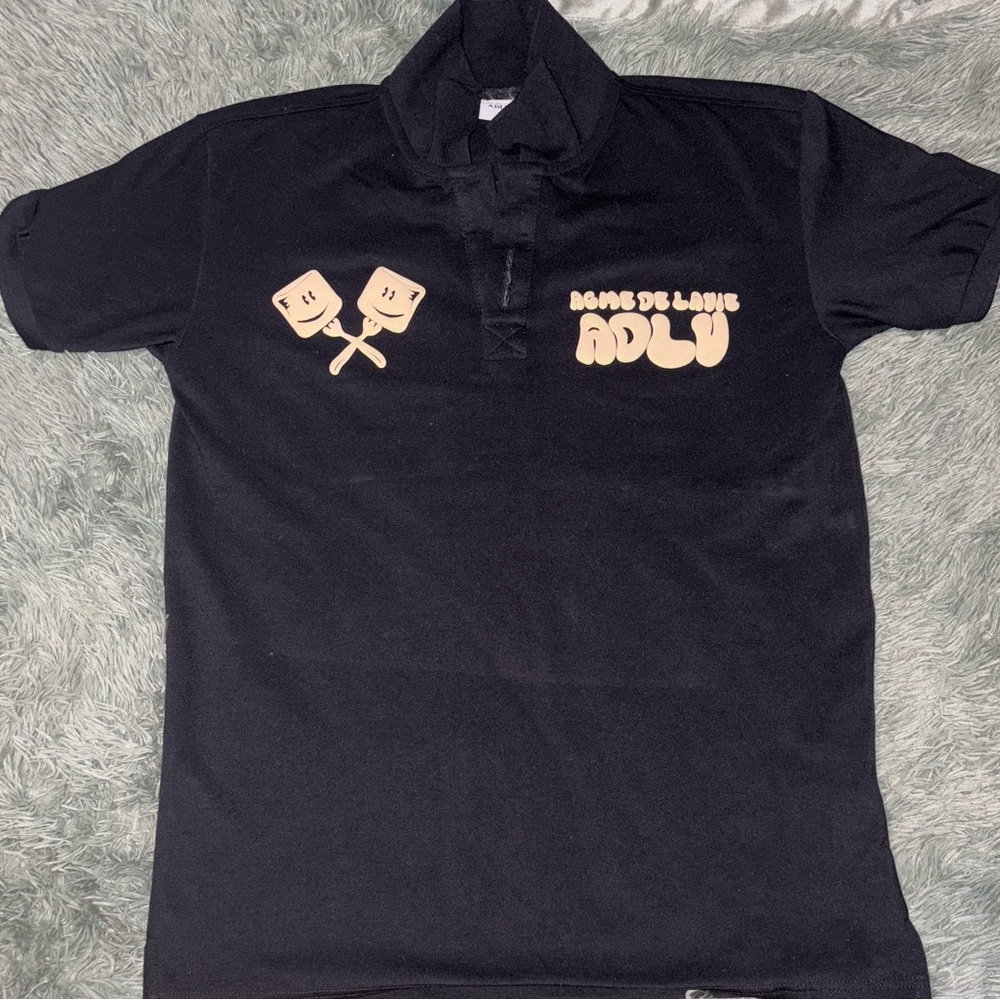 Black Polo Shirt with Marshmallow Graphic